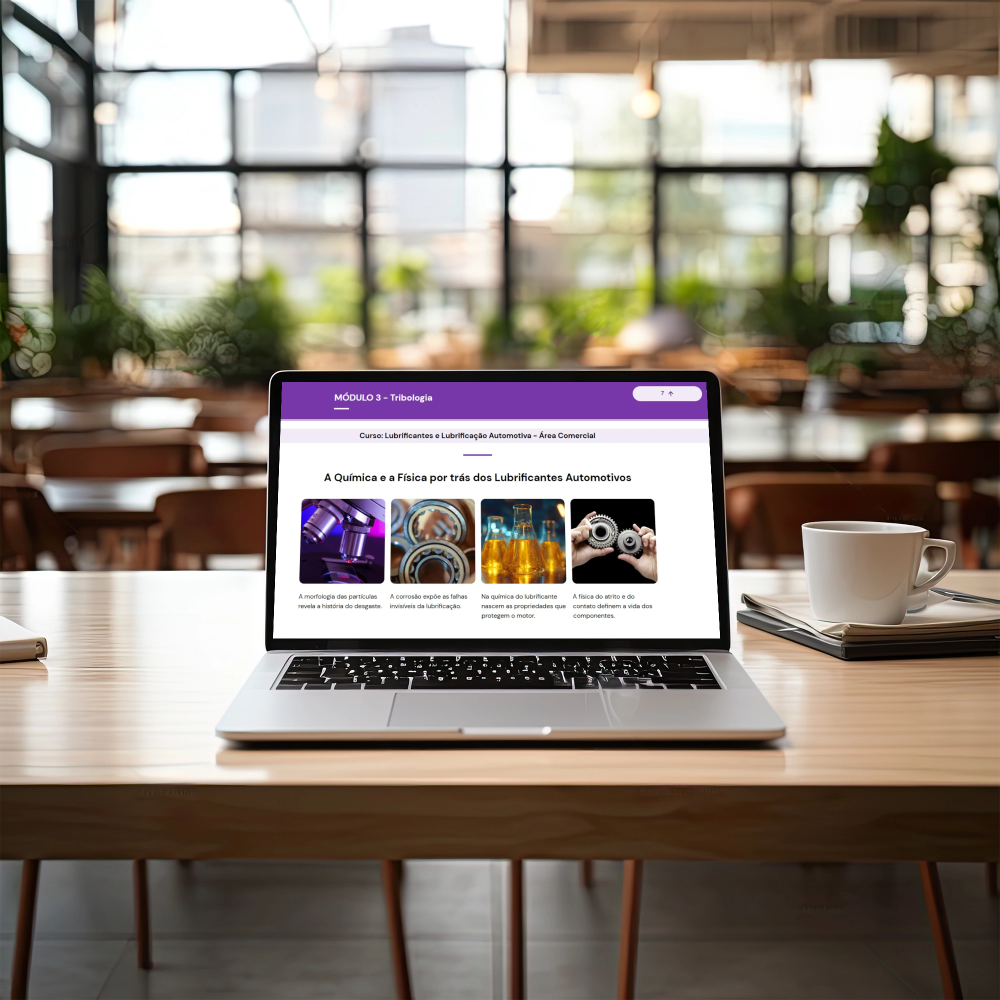 laptop on table with coffee cup and city view.png